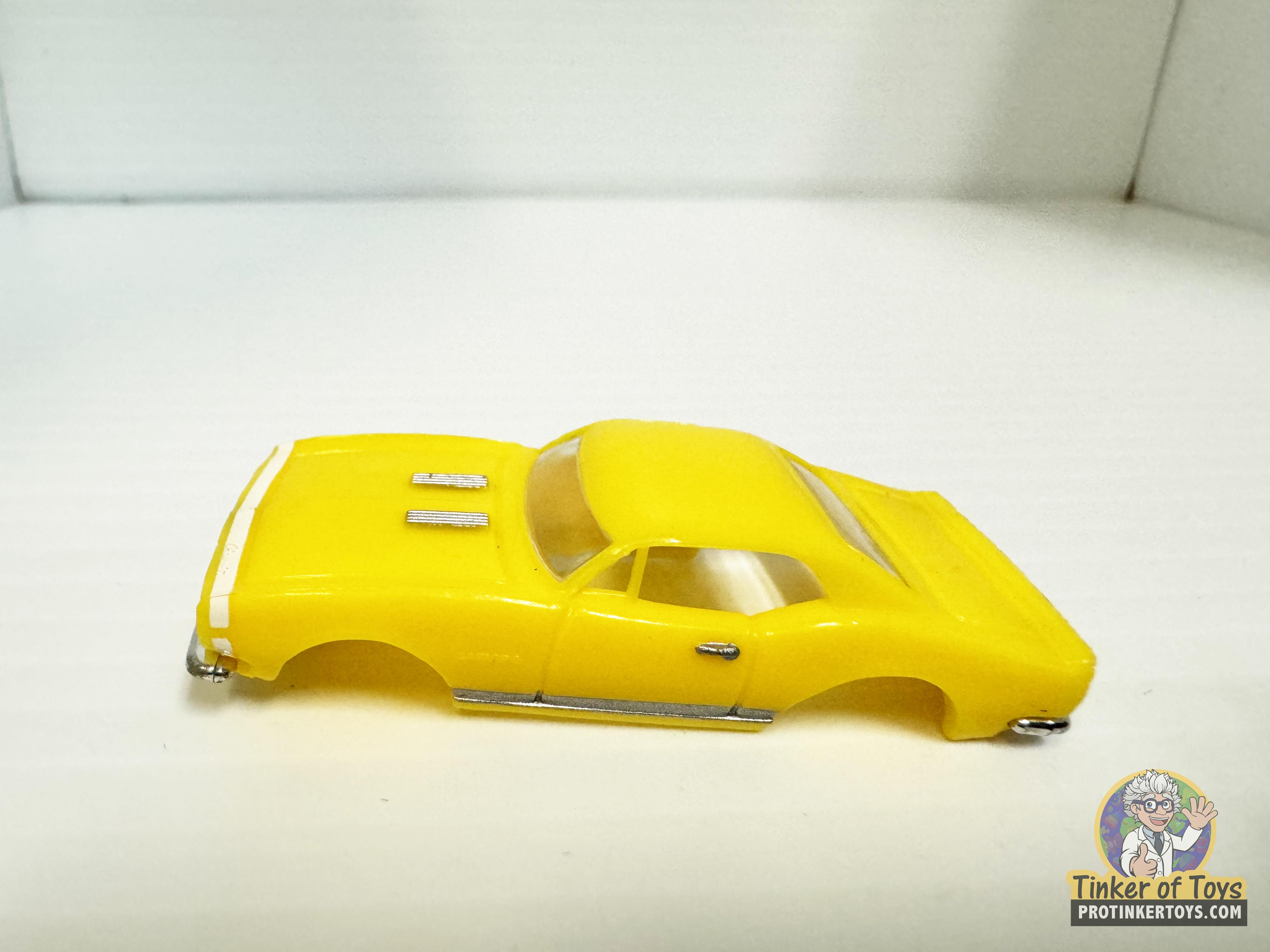 1967 Camaro with Yellow and White Stripe by Model Motoring - A Classic Slot Car Gem