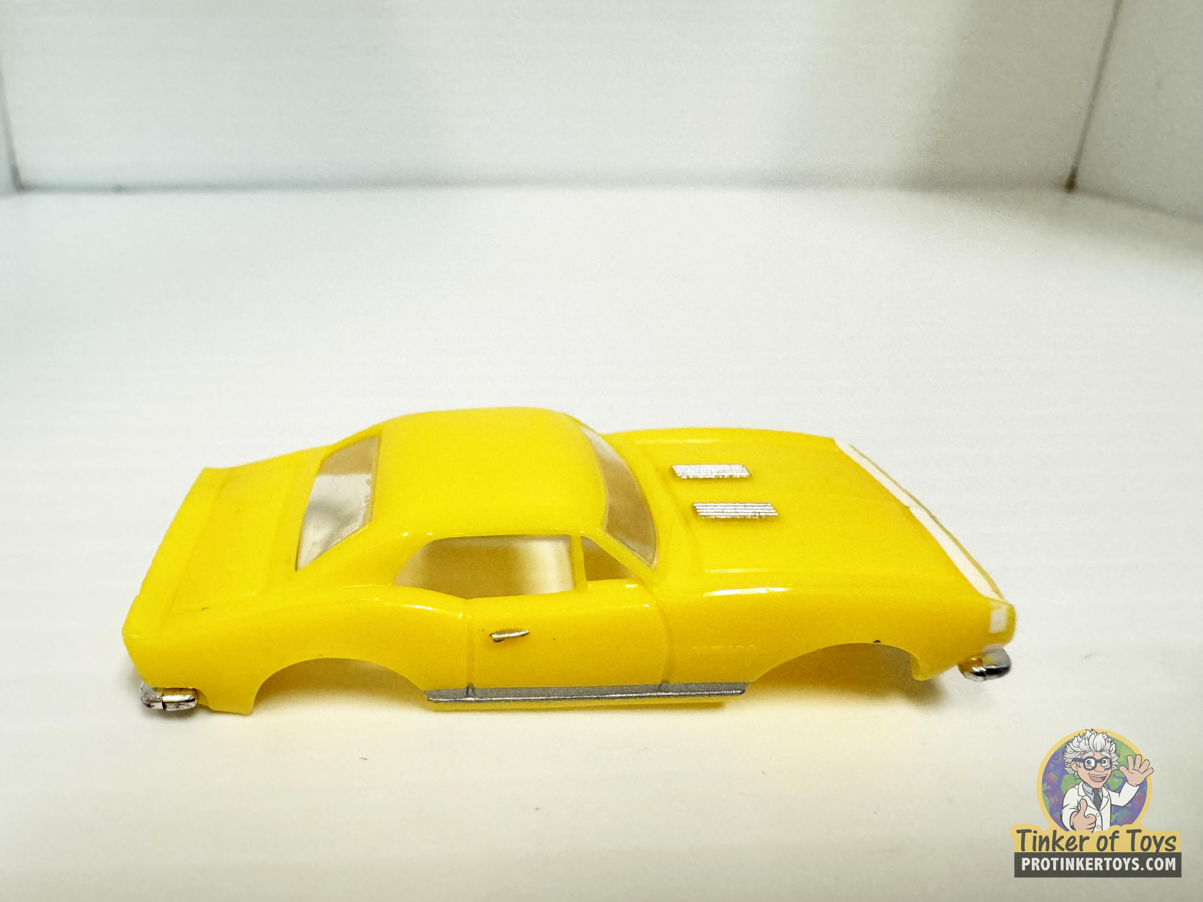 1967 Camaro with Yellow and White Stripe by Model Motoring - A Classic Slot Car Gem