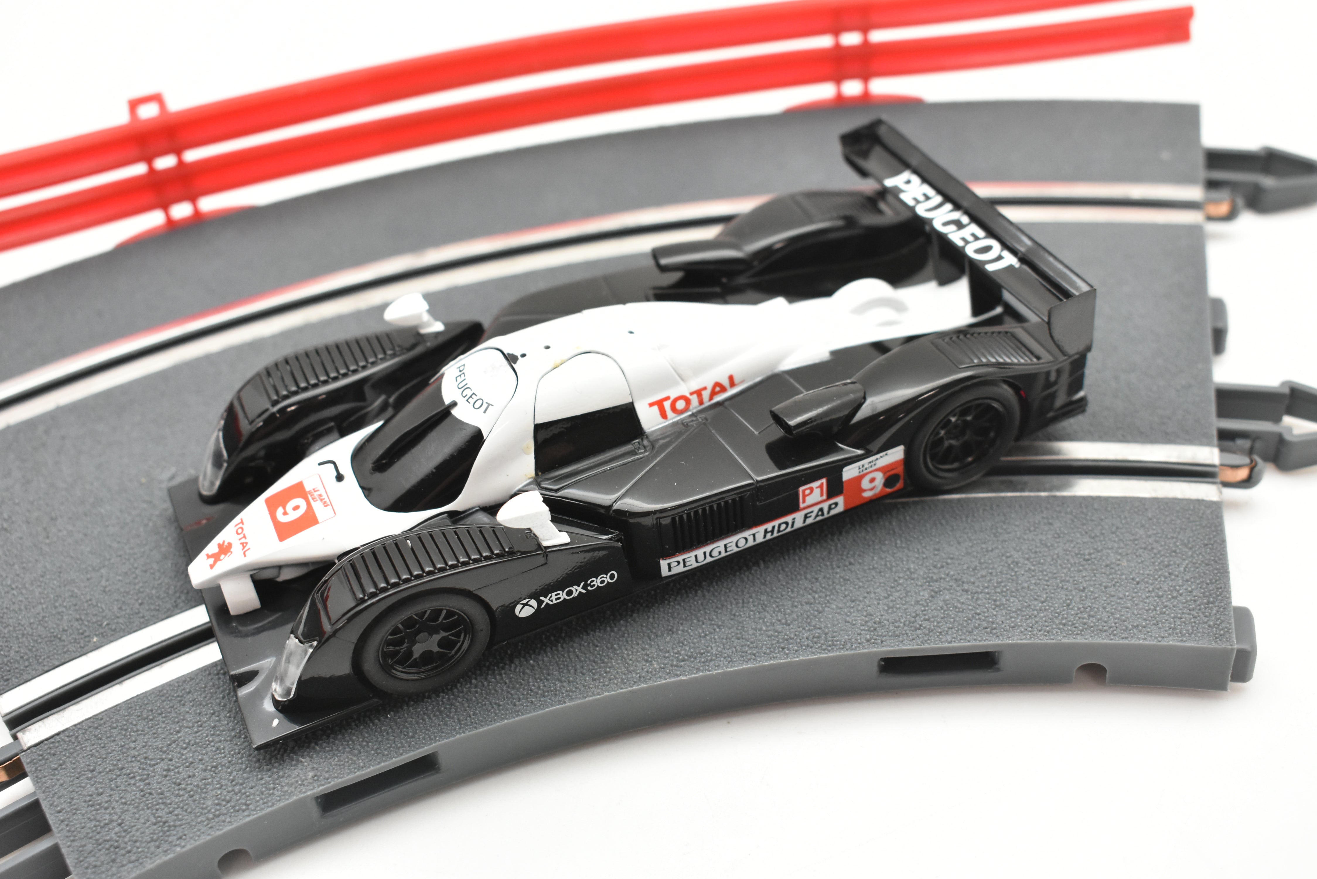 Thrilling A10301X3U0 SCX 1/32 Slot Car: PEUGEOT 908 HDI FAP - Race Now!