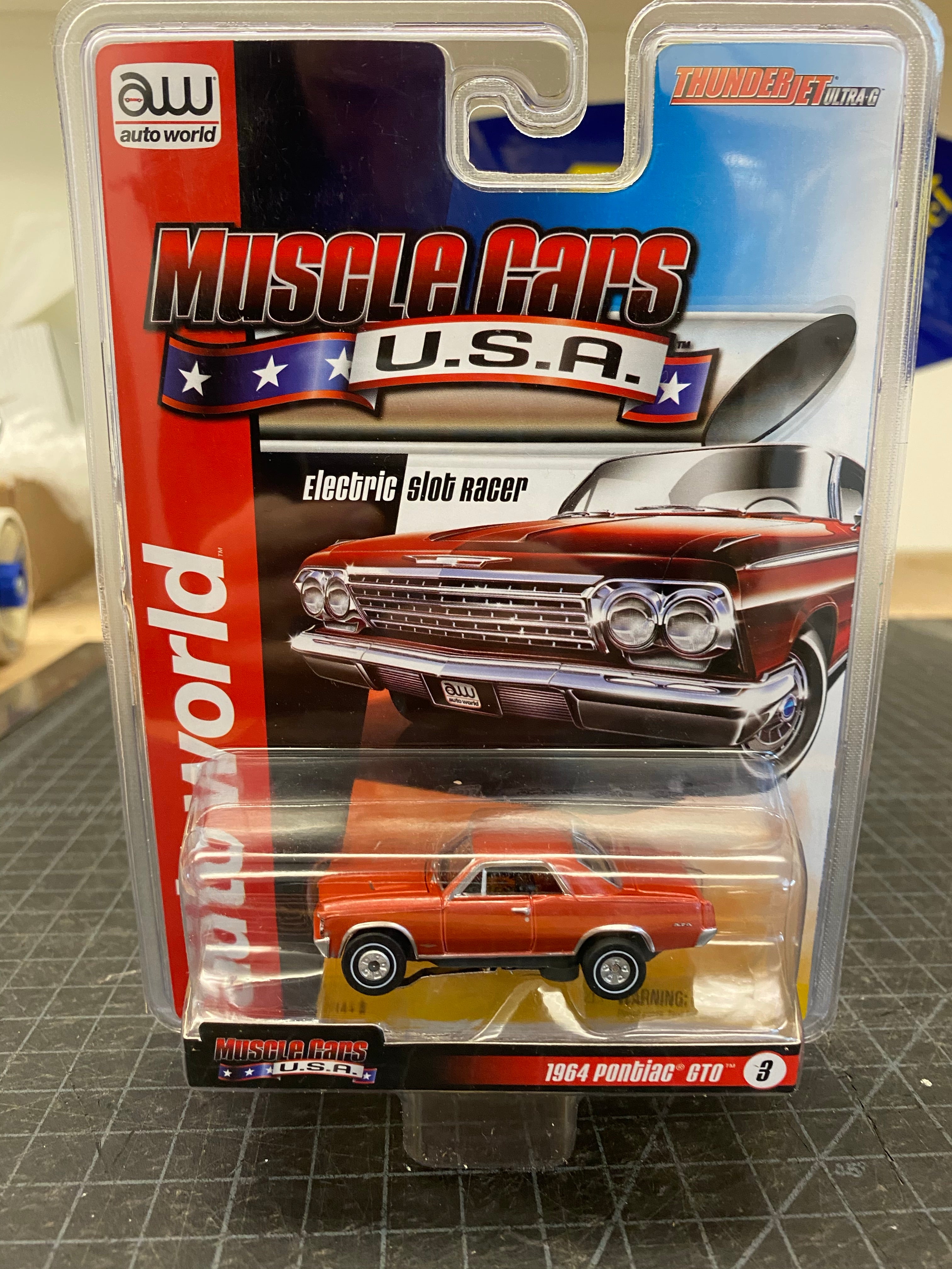 Auto World Thunderjet R25 USA Muscle Cars SC340 - The Ultimate Slot Car Collection
