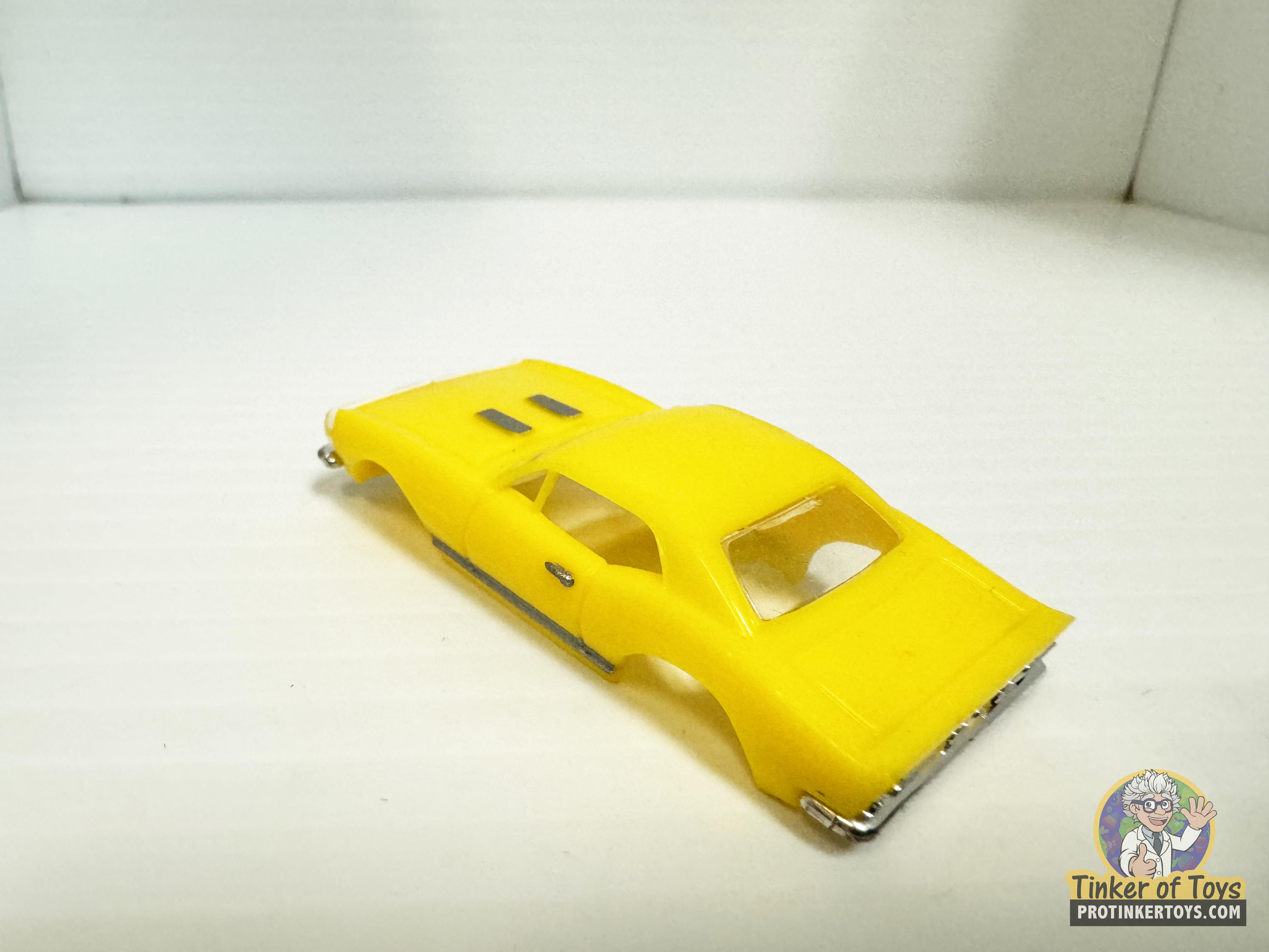 1967 Camaro with Yellow and White Stripe by Model Motoring - A Classic Slot Car Gem