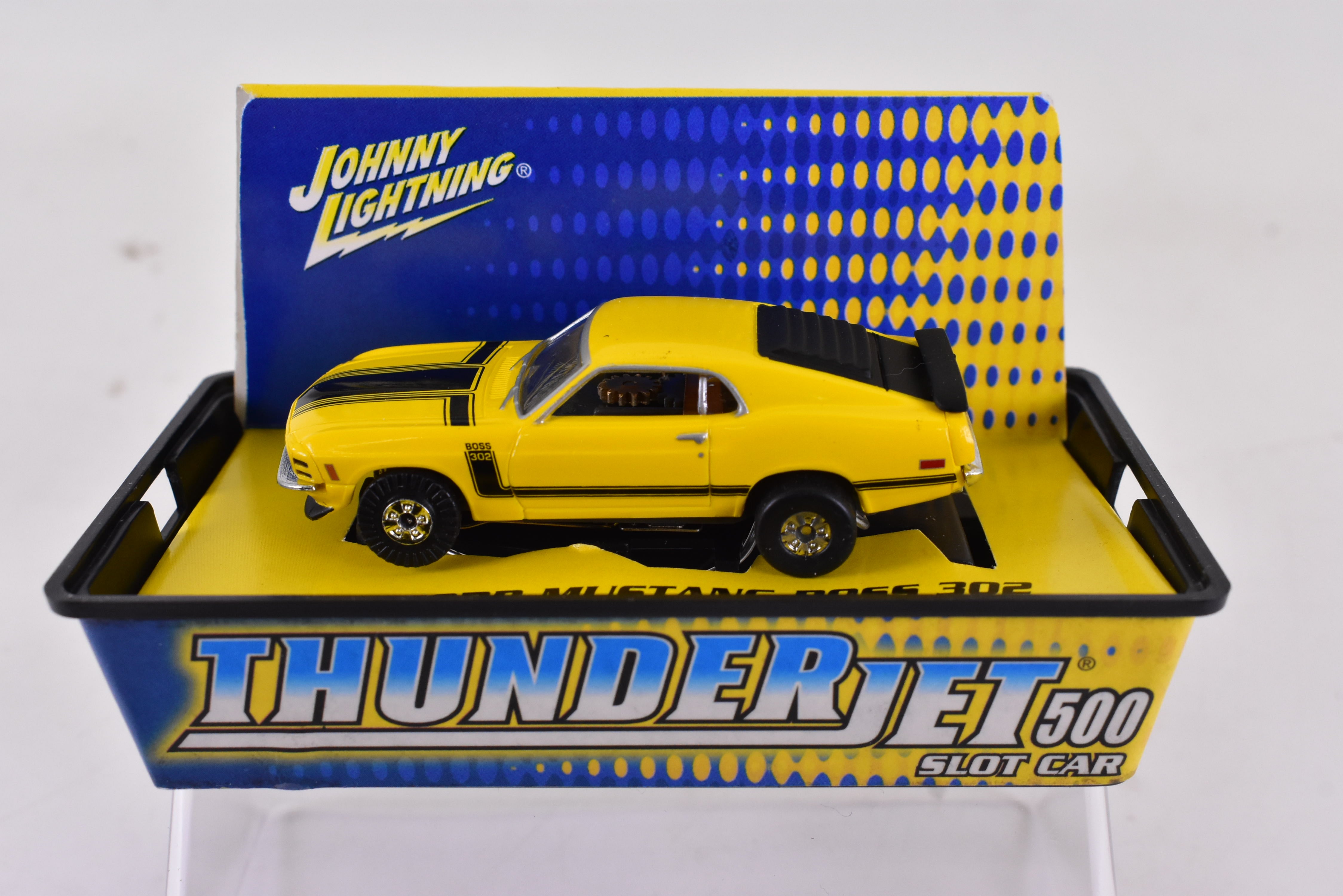 Unleash the Speed: 1970 Ford Mustang Boss 302 Yellow ThunderJet 500 Ho Scale Racer by Auto World
