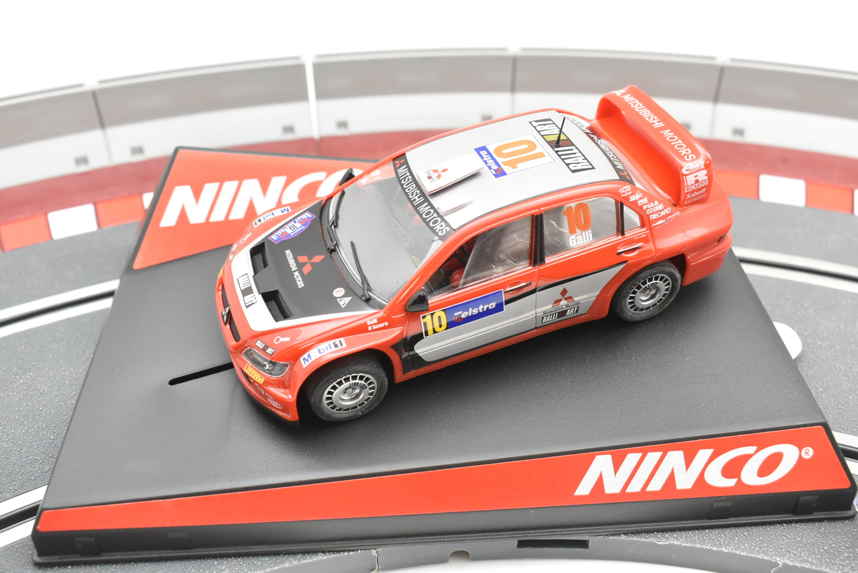 Unleash the Thrill: Mitsubishi Lancer WRC 2006 Australia GIGI GALLI by Ninco - 50378!