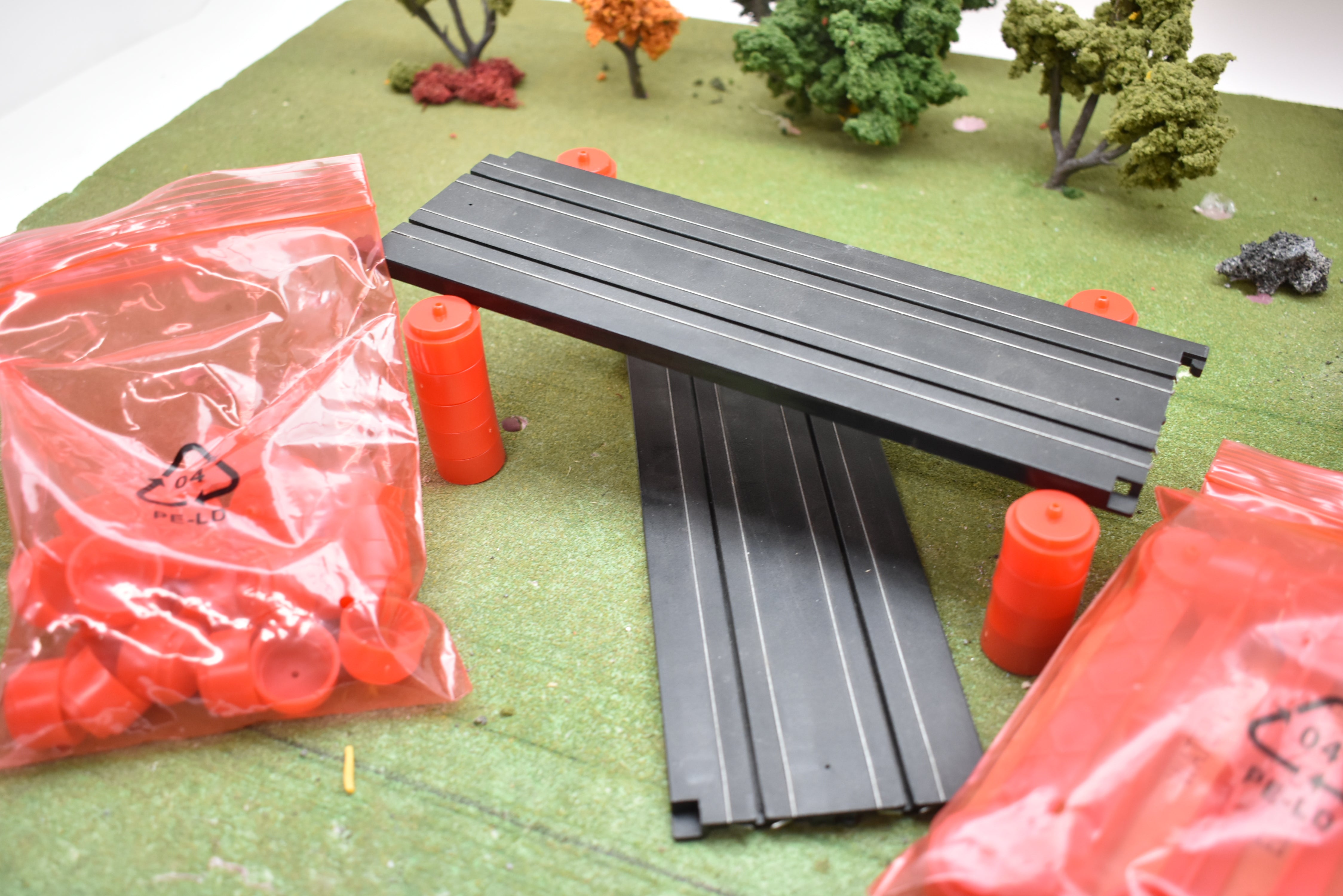 Auto World TRX101 Bulk Support and Flags - Upgrade Your Racing Layout!