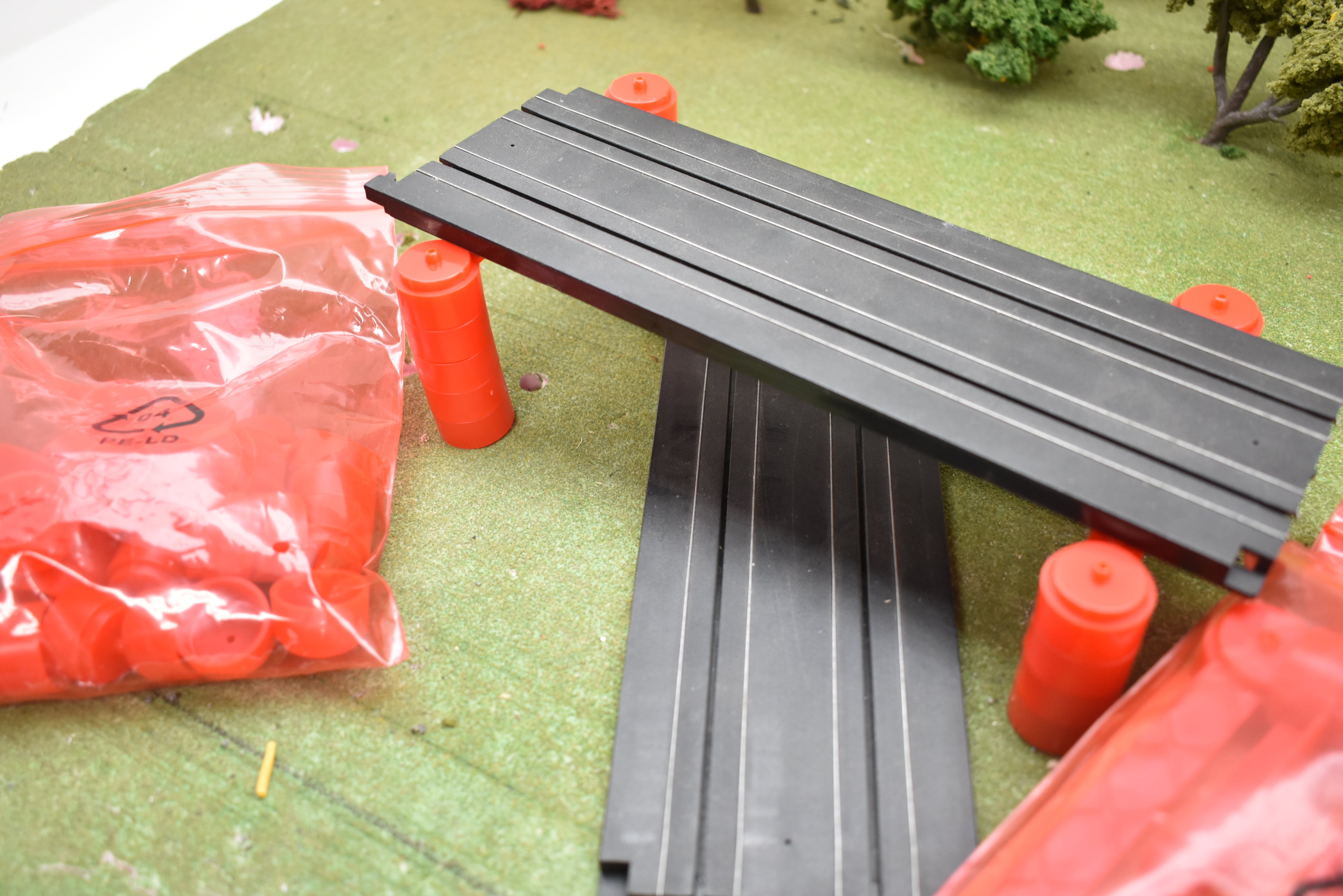 Auto World TRX101 Bulk Support and Flags - Upgrade Your Racing Layout!