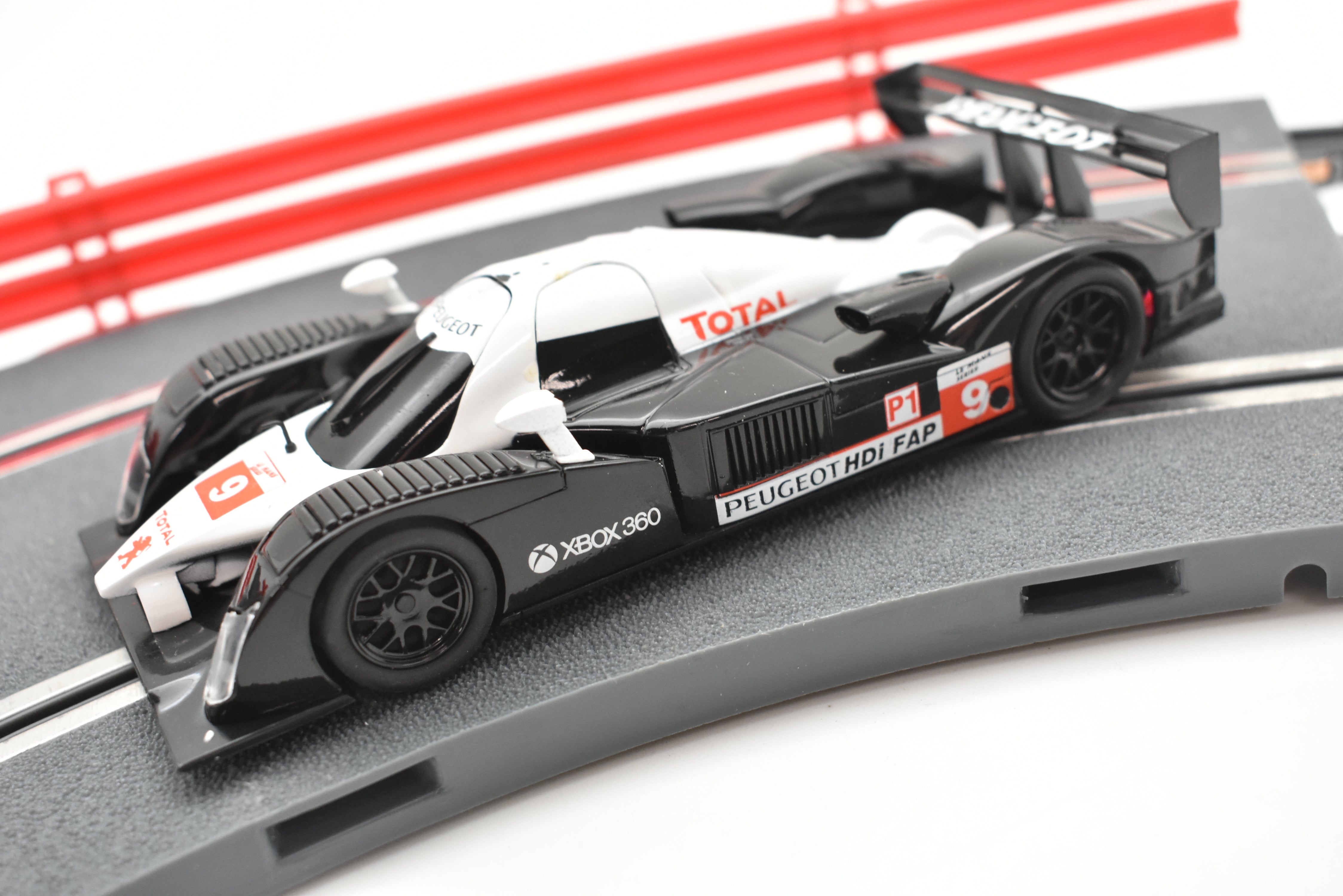 Thrilling A10301X3U0 SCX 1/32 Slot Car: PEUGEOT 908 HDI FAP - Race Now!