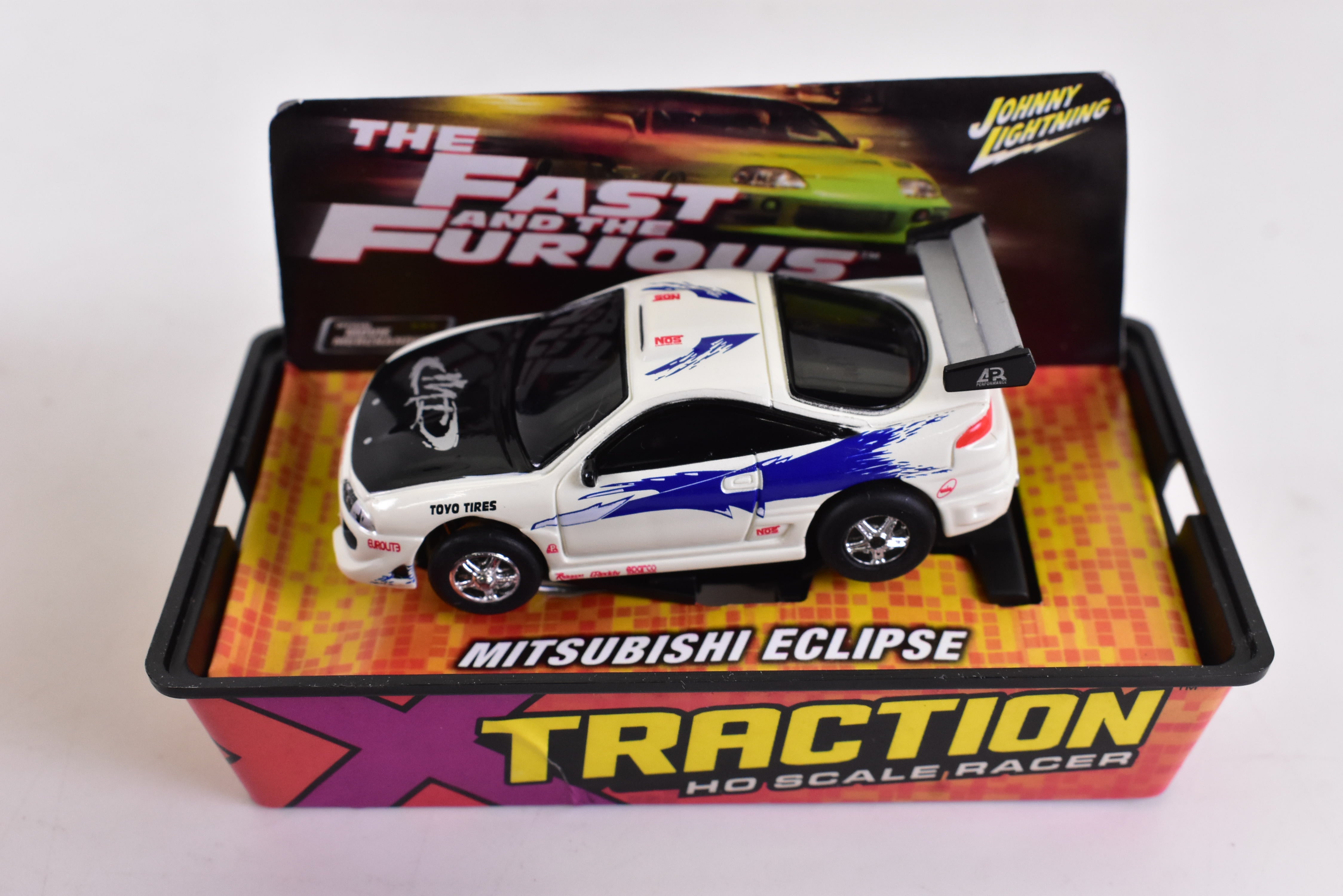 Mitsubishi Eclipse Gold Xtraction Chassis Ho Scale Racer - The Ultimate Racing Thrill! | 503 - 5 | Auto World
