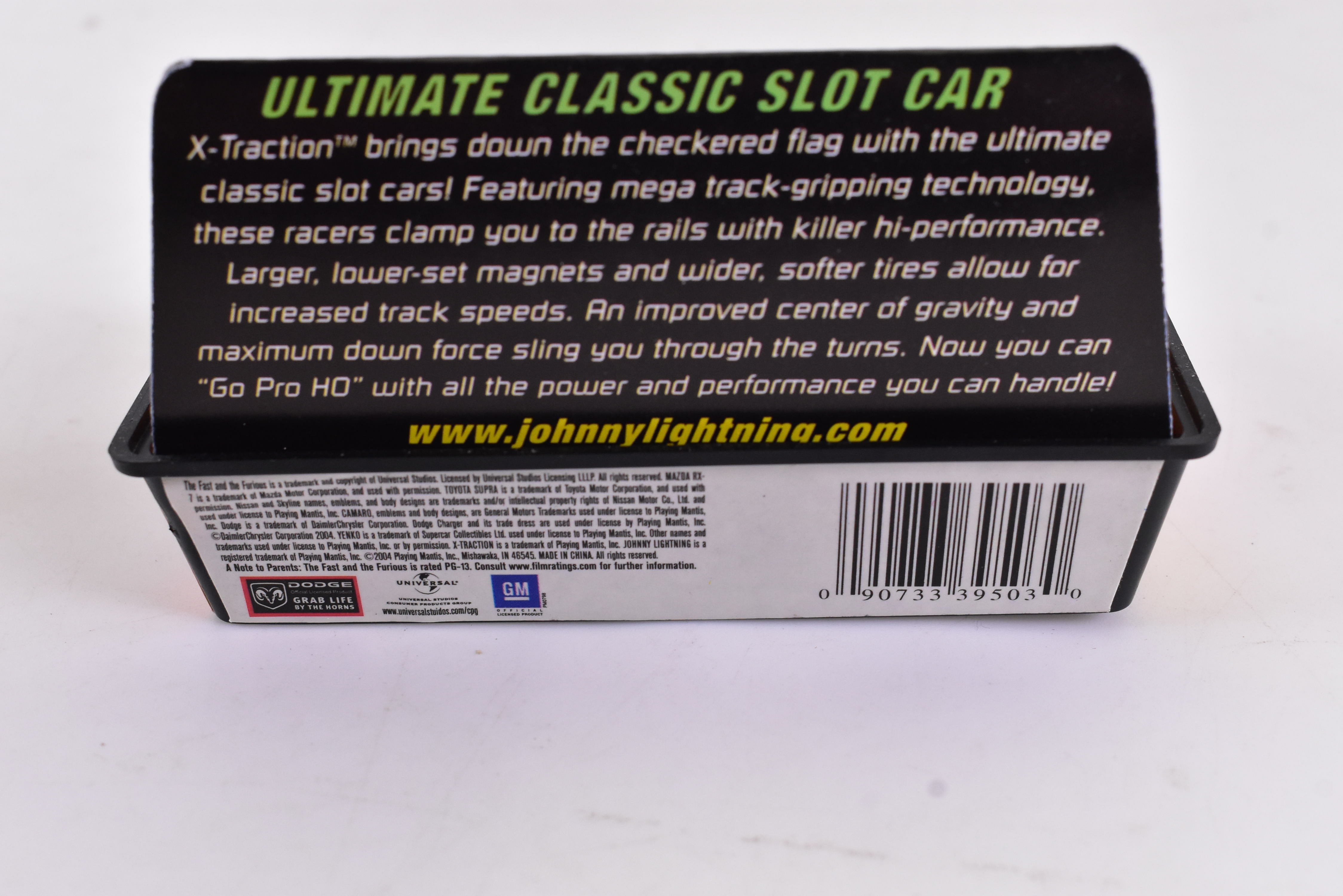 Get Your Hands on the Stunning Orange Mazda RX7 Ho Scale Racer with Xtraction Chassis! | 503-6 | Auto World