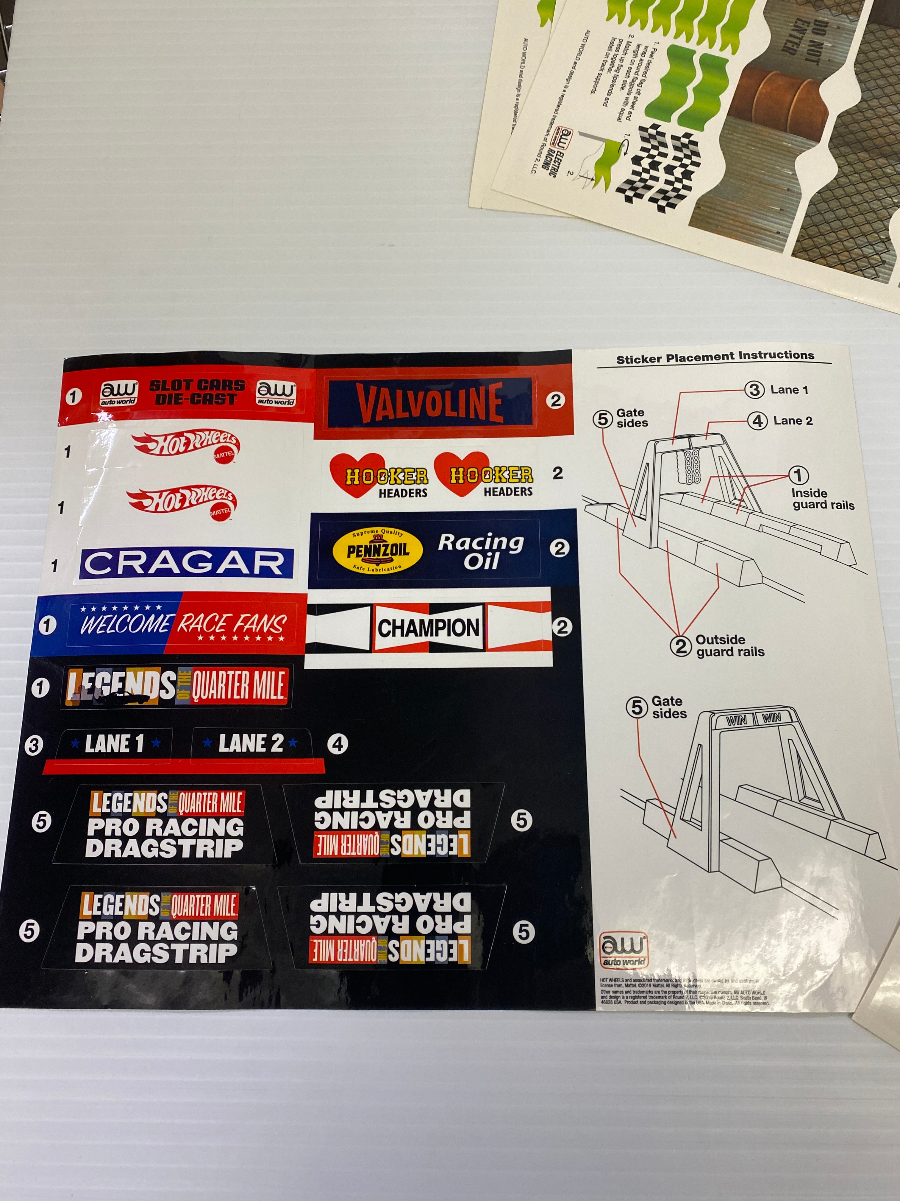 H.O. Scale Track Decals with Flags and Track Supports - TRX900: Essential Track & Car Accessories