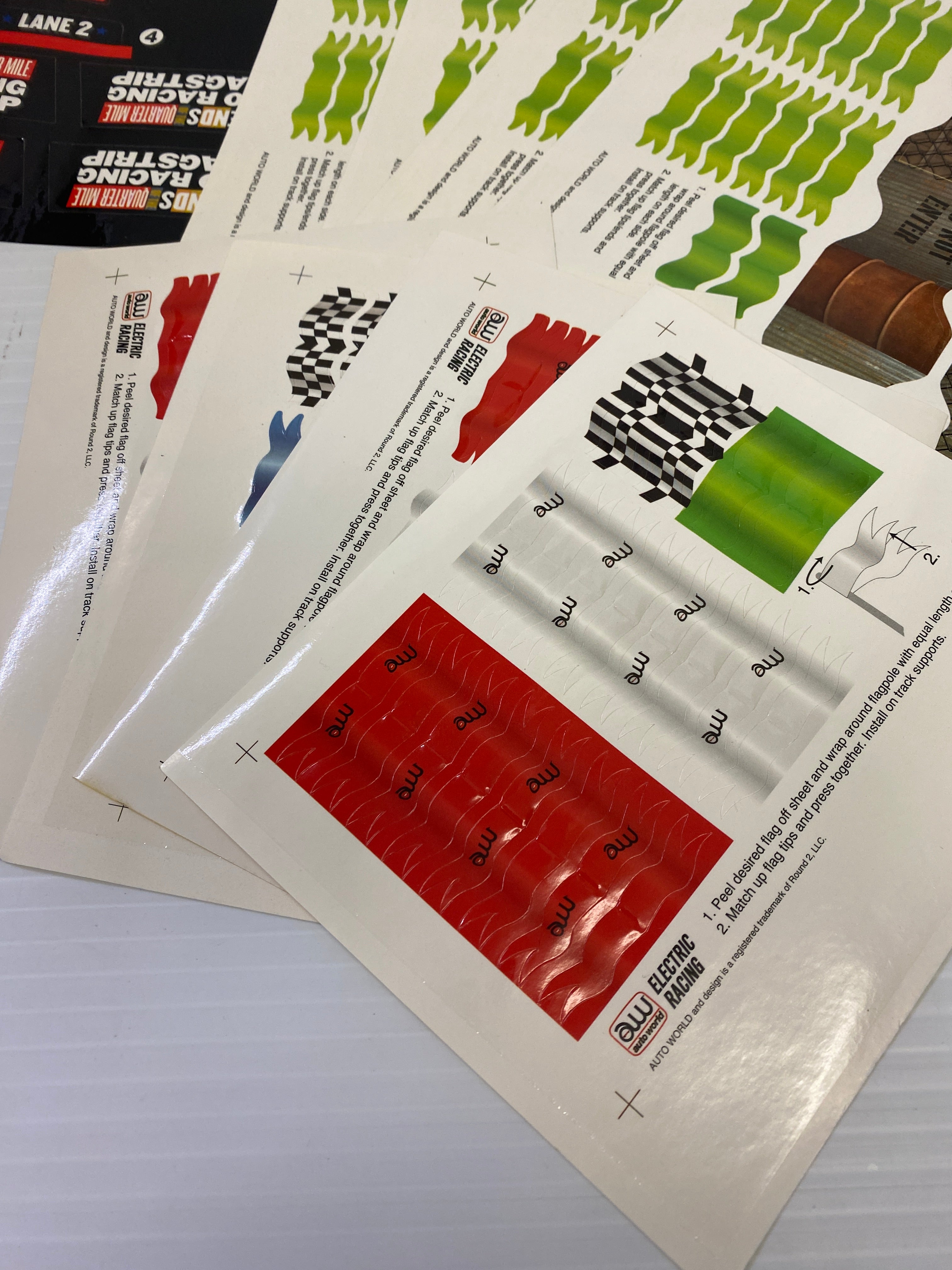 H.O. Scale Track Decals with Flags and Track Supports - TRX900: Essential Track & Car Accessories