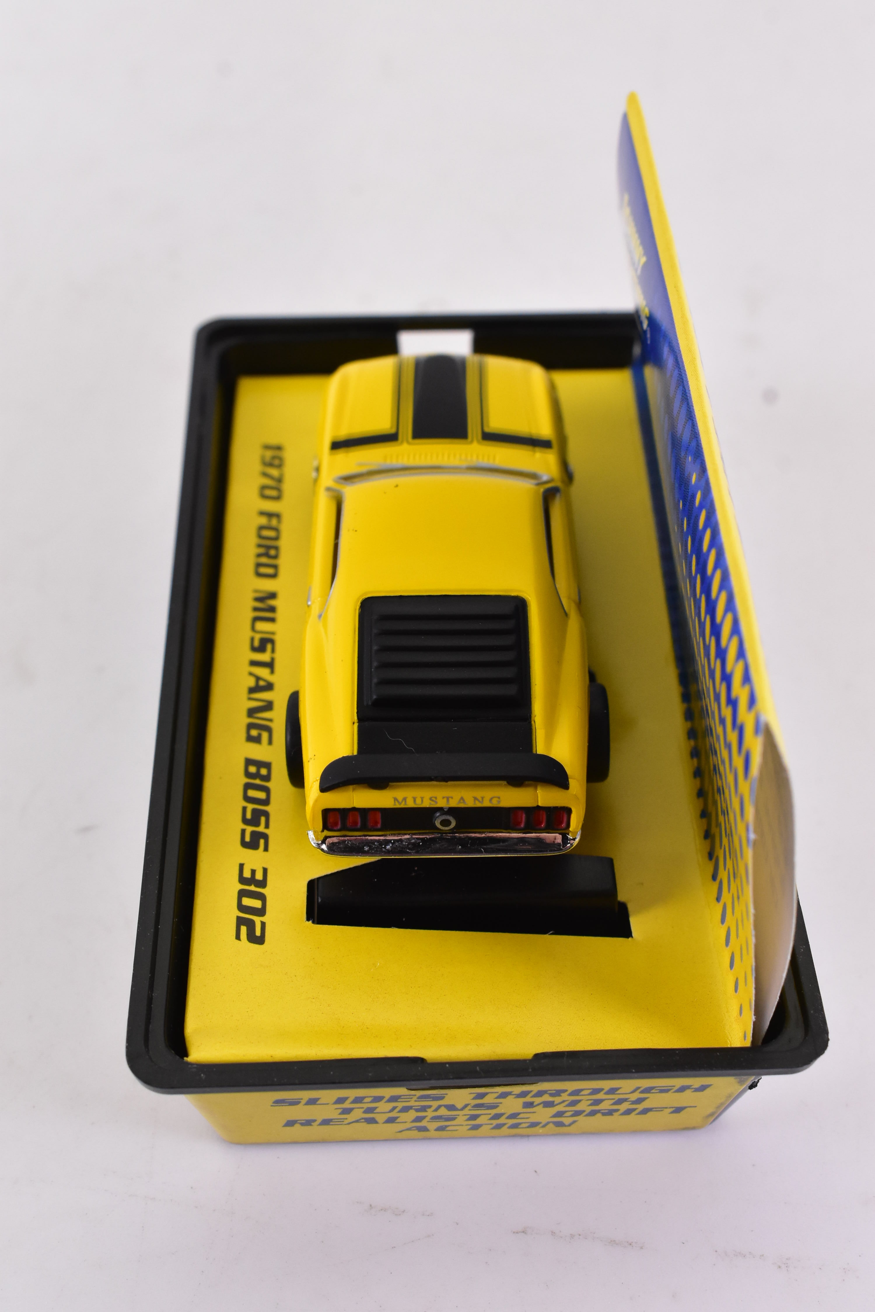 Unleash the Speed: 1970 Ford Mustang Boss 302 Yellow ThunderJet 500 Ho Scale Racer by Auto World