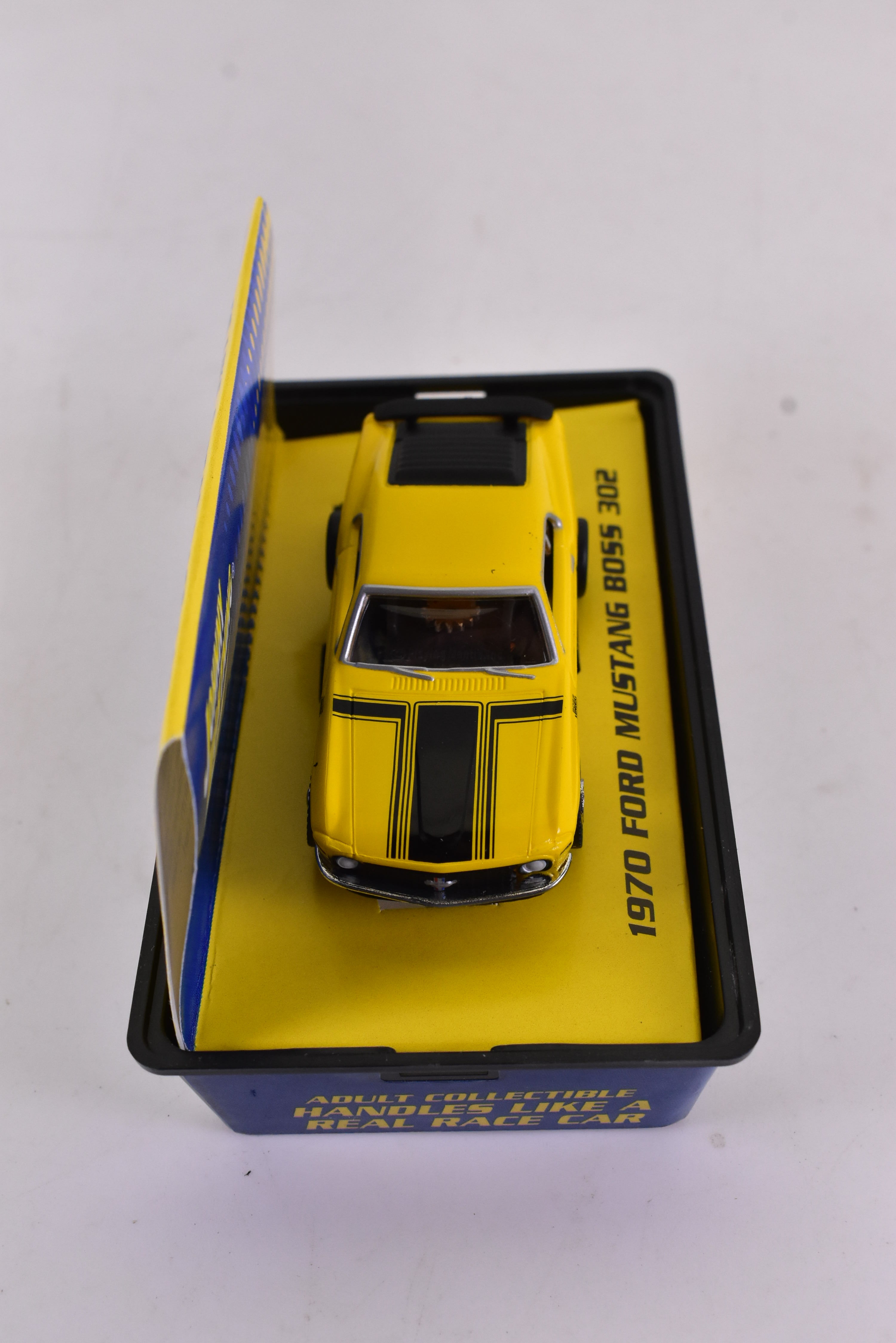 Unleash the Speed: 1970 Ford Mustang Boss 302 Yellow ThunderJet 500 Ho Scale Racer by Auto World