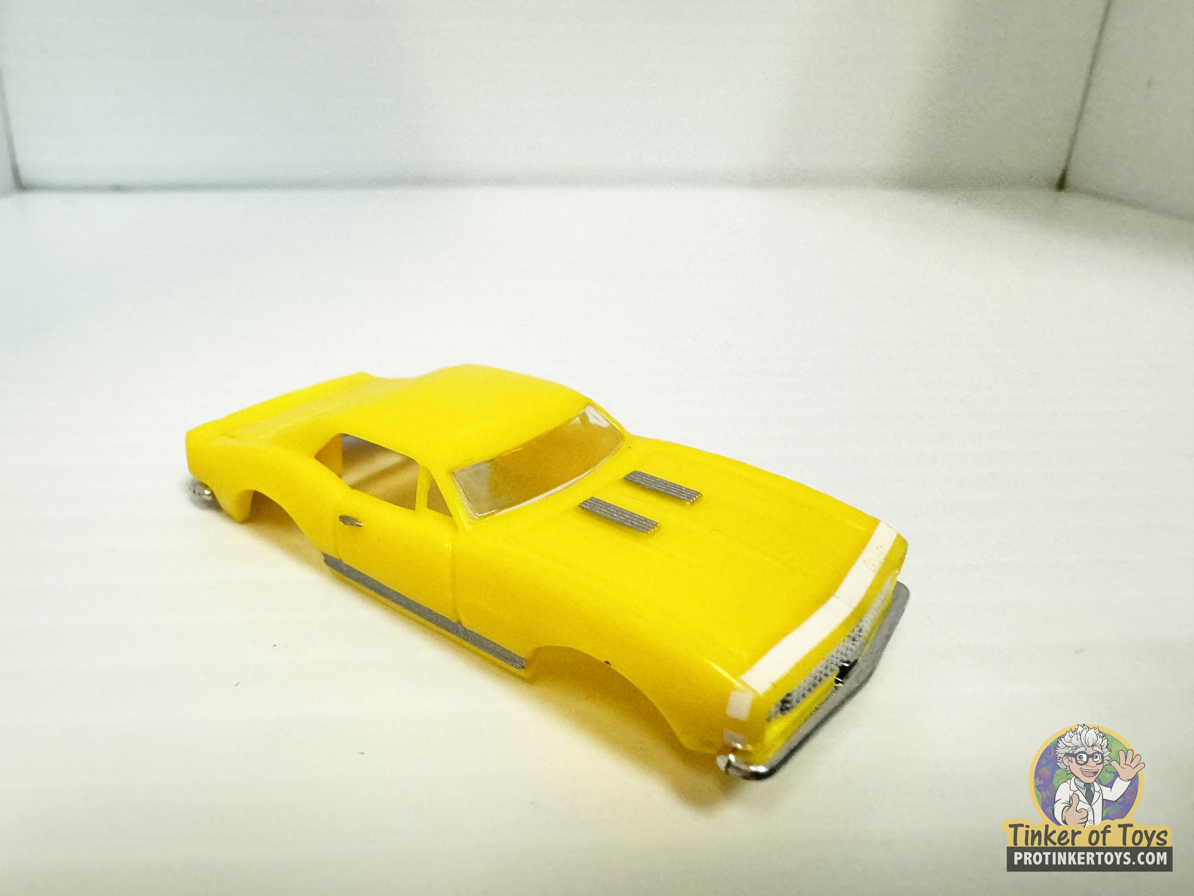 1967 Camaro with Yellow and White Stripe by Model Motoring - A Classic Slot Car Gem