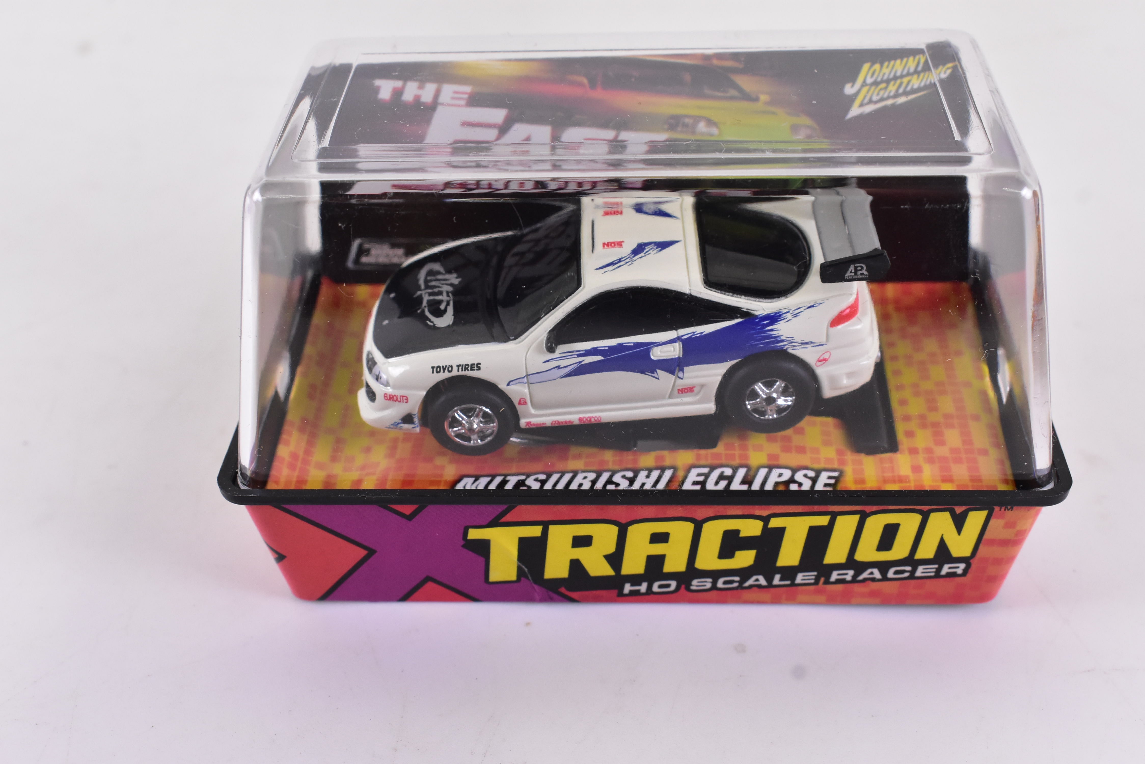 Mitsubishi Eclipse Gold Xtraction Chassis Ho Scale Racer - The Ultimate Racing Thrill! | 503 - 5 | Auto World