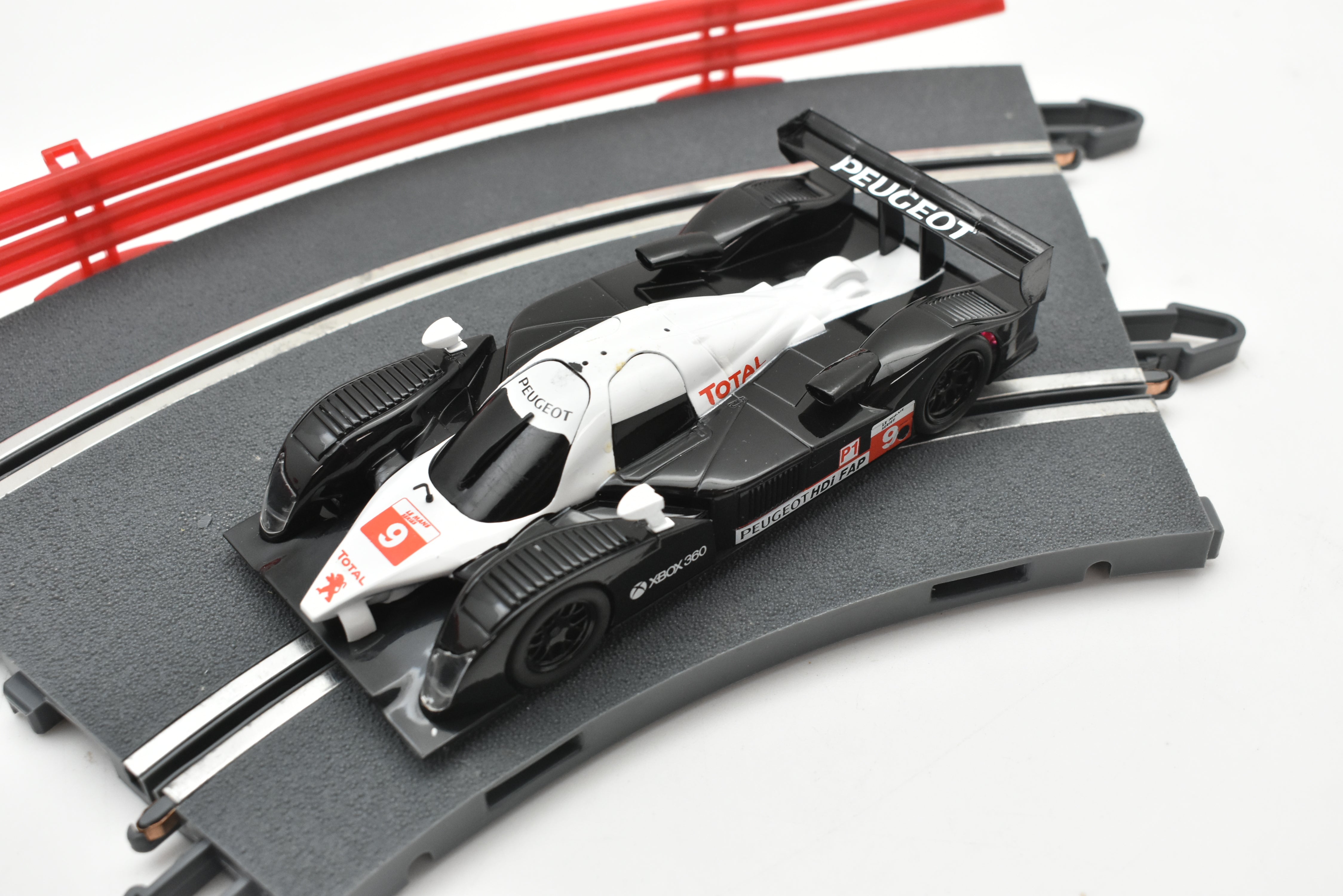 Thrilling A10301X3U0 SCX 1/32 Slot Car: PEUGEOT 908 HDI FAP - Race Now!